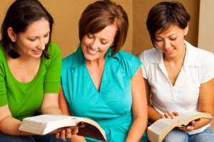 Three mormon women reading the Bible