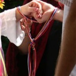 hands bound together for handfasting