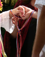 hands bound together for handfasting