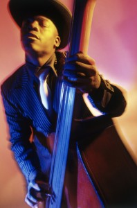 Close-up of a male musician playing a bass