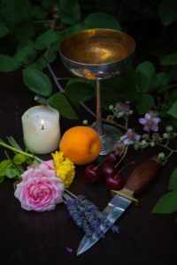 Table with items commonly used in for rituals of paganism.