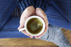 Drinking a cup of cozy winter tea can bring in the new season.