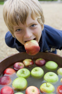Bobbing for apples is a famous Halloween Tradition.