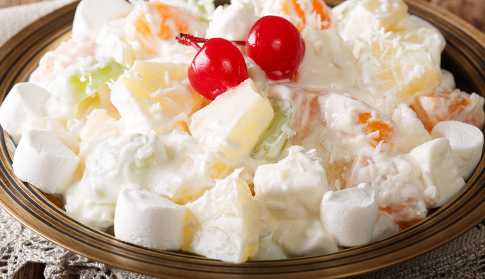 Modernity's divine edible; an ambrosia salad topped by two cherries