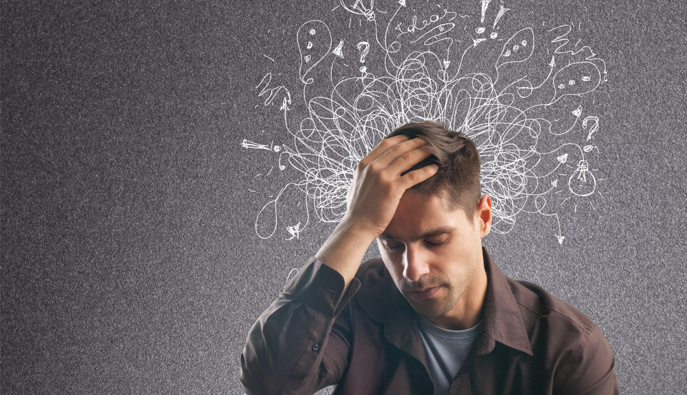 A man with ADHD engages in meditation.