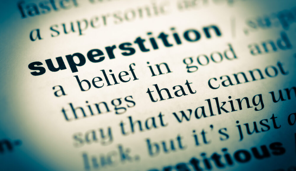 A dictionary entry for "superstition."