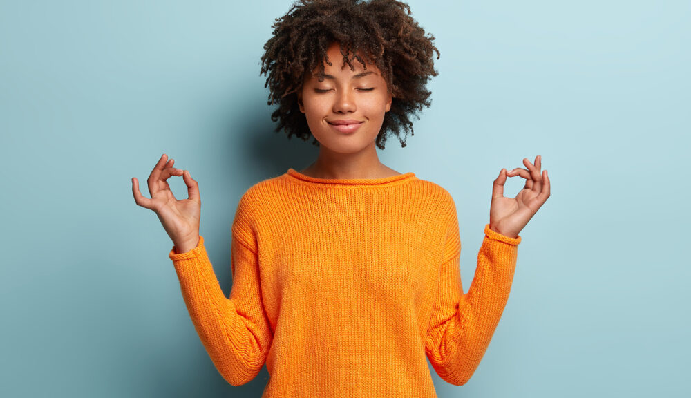 A woman practices mindfulness.