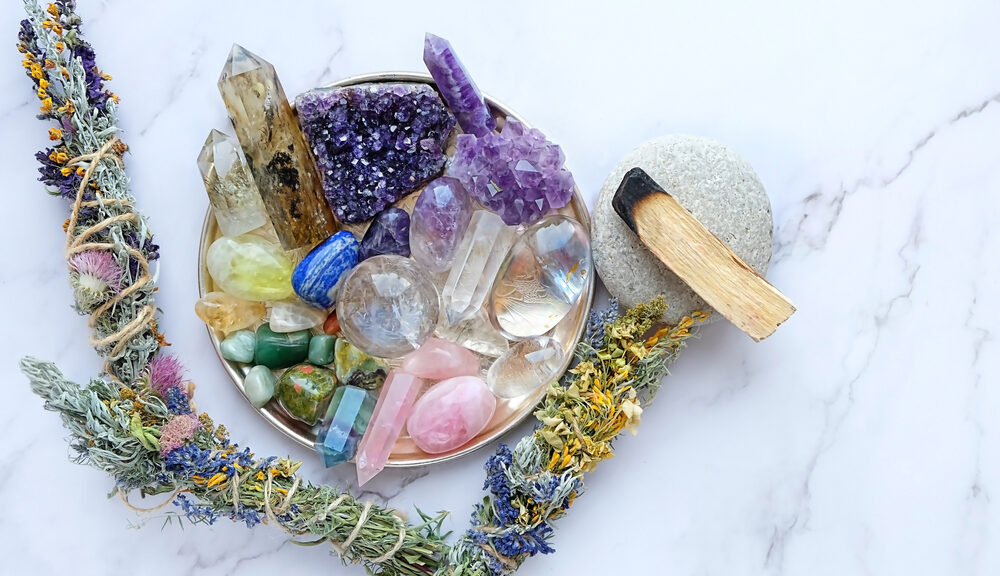 A collection of healing crystals on top of a plate.