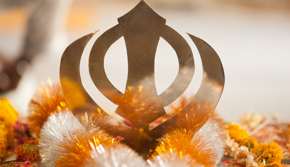 A picture of the symbol of Sikhism.