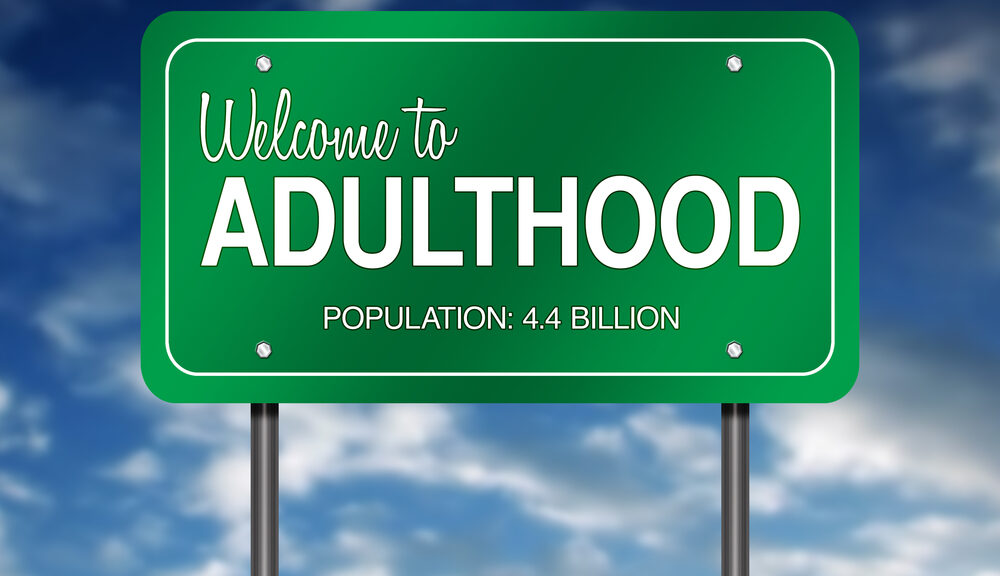 A sign saying "welcome to adulthood"--presumably you first have to pass through coming of age.