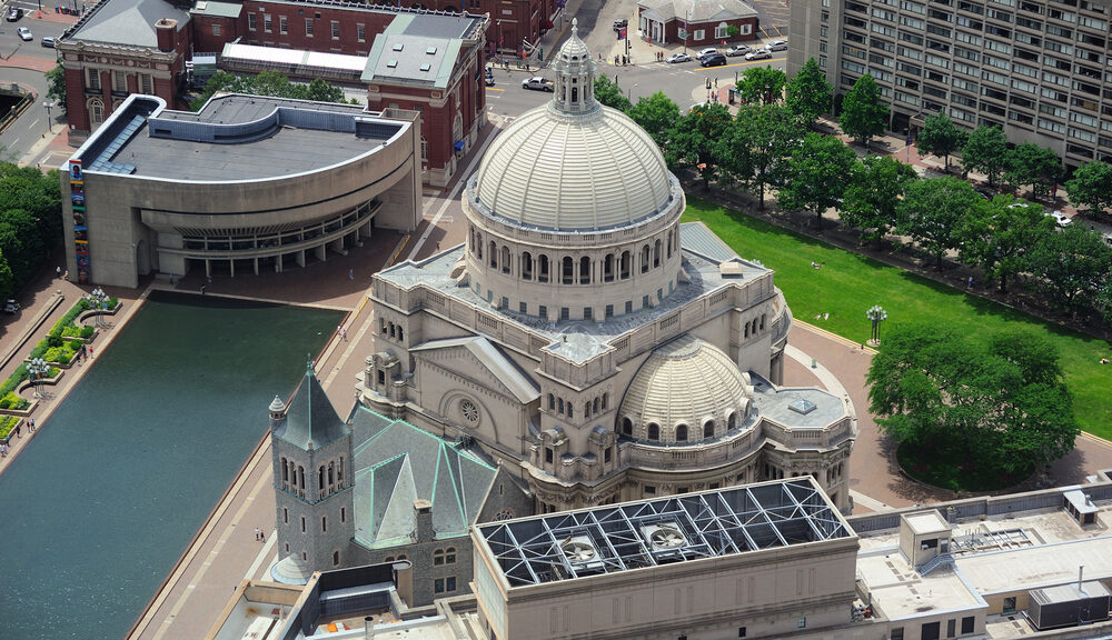 A bird's-eye view of a white domed building.